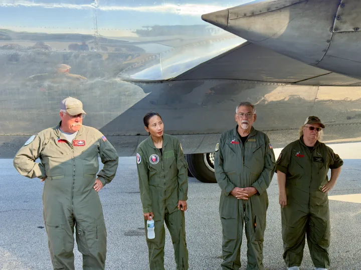 Flight crew beside the aircraft