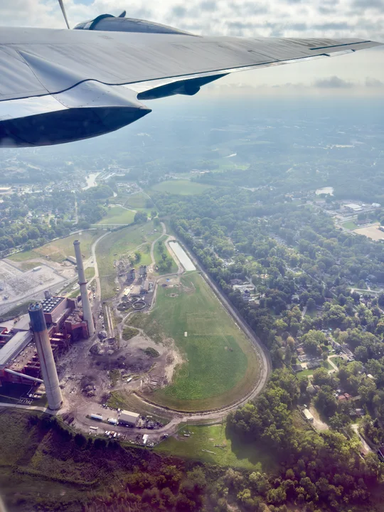 The landscape beneath the wing