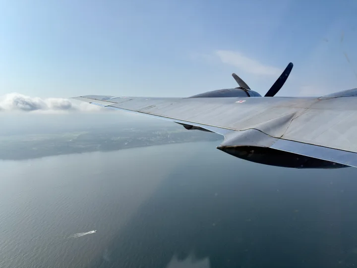 Above the clouds and water
